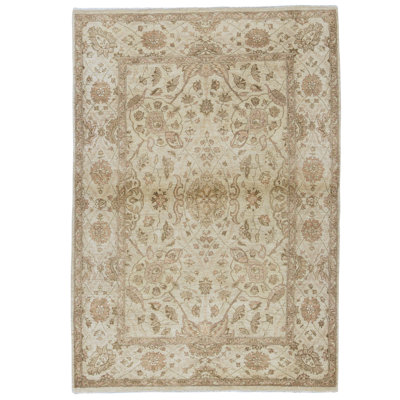 Hand Knotted Wool Area Rug in Cream