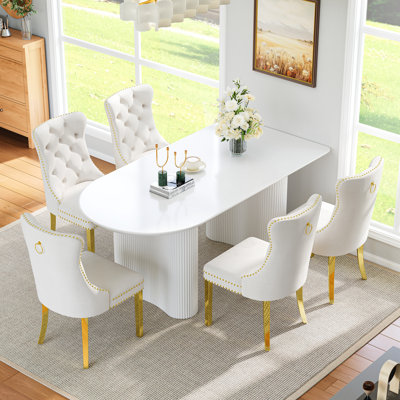 63" Oval Dining Table Set Of 7, Modern Minimalist Cream White Double Base Dining Table, 6 White Velvet Dining Chairs With Gold Stainless Steel Legs, Nailhead Trim