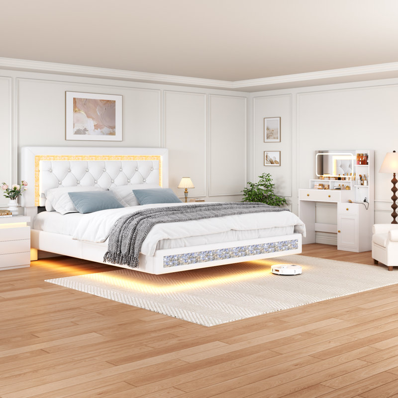 Lit plateforme flottant en similicuir blanc, taille standard, avec tête de lit capitonnée en losanges et éclairage LED. Sommier non requis, conception silencieuse, montage facile.