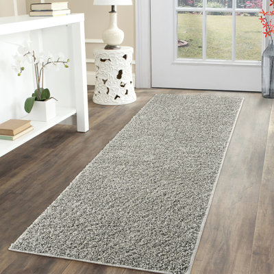 Tapis intérieur / extérieur beige en polypropylène tissé à la machine Alcoa