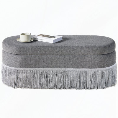 Oval Upholstered Storage Ottoman with Fringe Trim, Lift-Top Lid & Metal Legs