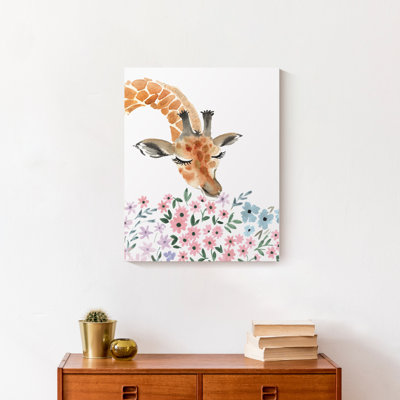 Giraffe Smelling Flowers Canvas Print