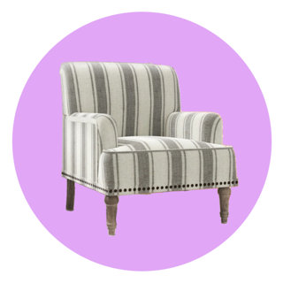 Grey and cream striped armchair with dark wooden legs on a purple circular background.