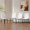 Ensemble de 4 chaises d'appoint en similicuir blanc avec pieds en métal noir profond, sièges de salle à manger à haut dossier ergonomiques, style moderne et luxueux, L 16,3 po x l 16,8 po x H 36,7 po