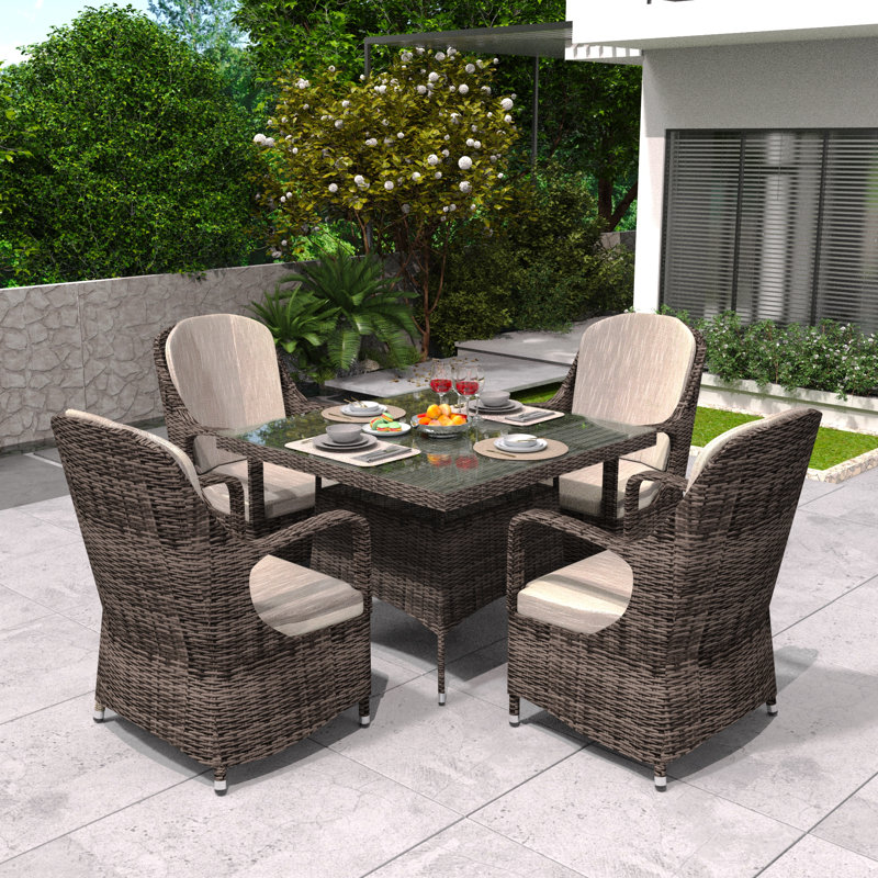 4 - Person Wicker Patio Dining Set with Square Table , Cushions Included, Brown/Beige