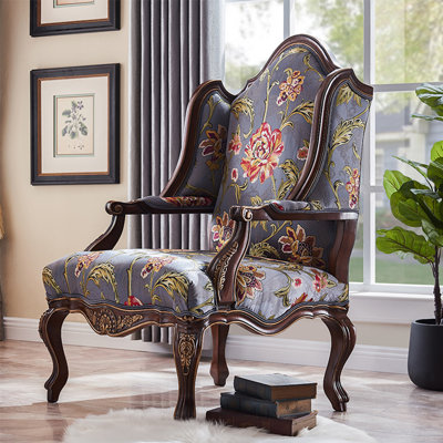 Upholstered Armchair with Ottoman