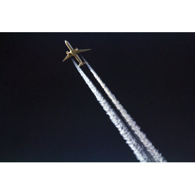 Plane In-Flight Contrails by KenRinger - Wrapped Canvas Print