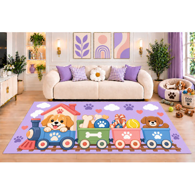 Tapis « Ultra Fin » 152 x 213 cm (5 pi x 7 pi) à motif de chiot et train lavande. Parfait pour la chambre d'enfant, la chambre de bébé ou la salle de jeux. Dos en silicone antidérapant. Poils courts.