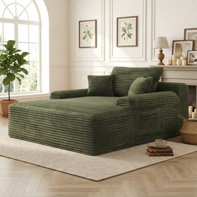Chaise longue convertible en velours côtelé de 165 cm de large avec de larges accoudoirs et deux coussins décoratifs. Aucun assemblage requis.