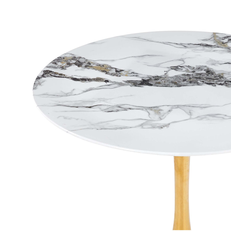 Table de salle à manger ronde en marbre veiné avec piètement doré pour quatre à six personnes dans les cuisines modernes