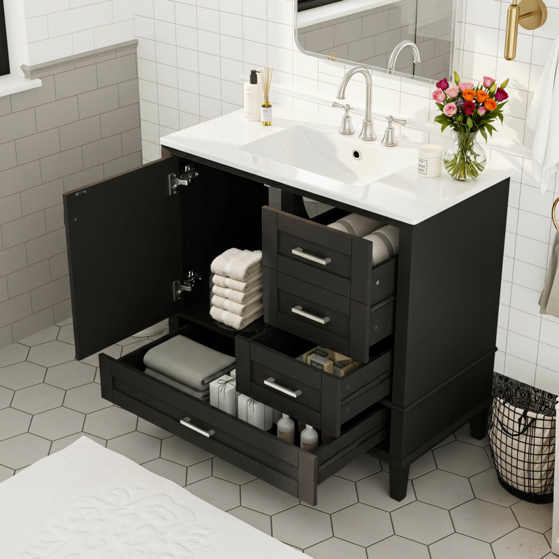 Meuble-lavabo noir de 36 po avec une porte à fermeture douce et trois tiroirs (profond, peu profond et long). Unité de rangement moderne.