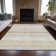 Machine Washable Indoor/Outdoor Xhevrie Ivory Rug