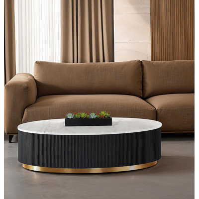 Table basse ovale de style contemporain avec plateau en marbre pour le salon