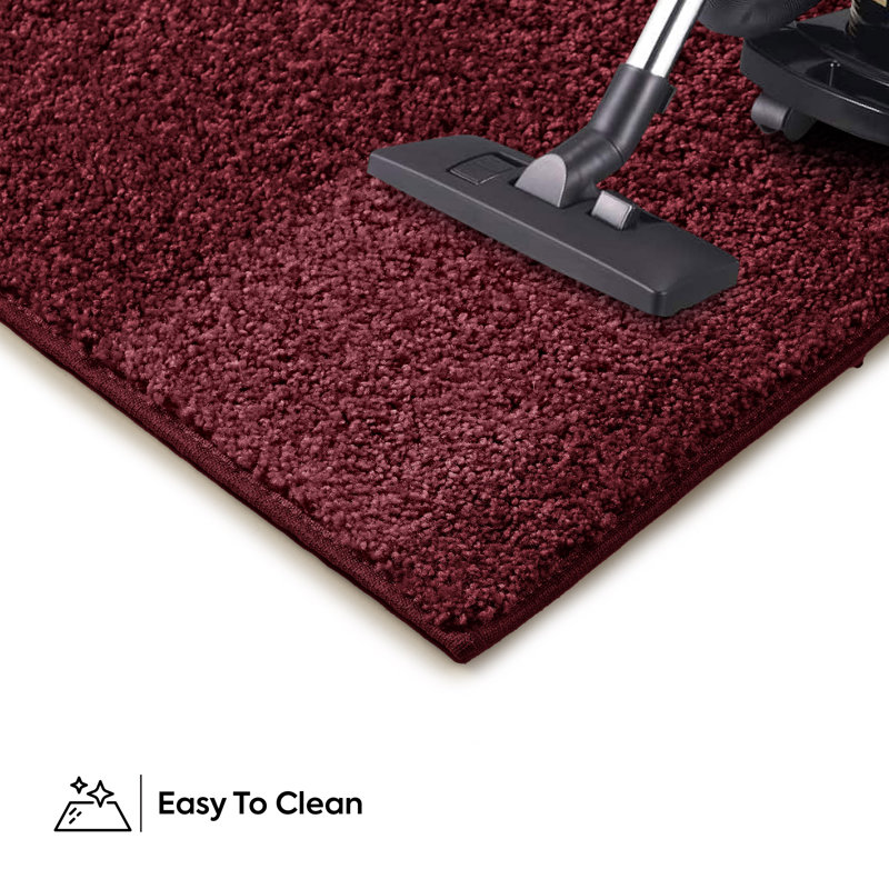 Burgundy Oval 2' x 3' Stain-Resistant Synthetic Kids Rug