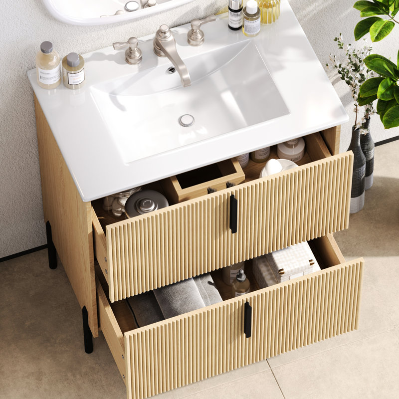 Meuble-lavabo de 76 cm (30 po), lavabo en céramique, tiroirs extensibles, coulisses encastrées à fermeture amortie, design cannelé, aspect naturel, décor moyen, agencement unique des tiroirs de rangement.