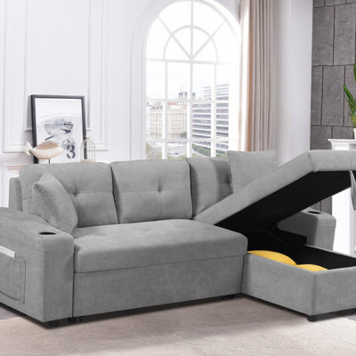 Canapé d'angle convertible avec rangement pour accoudoirs, méridienne droite et revêtement gris pour les salons et les appartements modernes.
