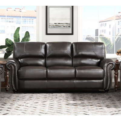 3 sièges, cuir brun foncé traditionnel, accoudoirs roulés, garniture cloutée, structure en bois massif, rembourrage en mousse haute densité, 100% cuir fleur, coussins de dossier amovibles, coussins de siège attachés avec accoudoirs