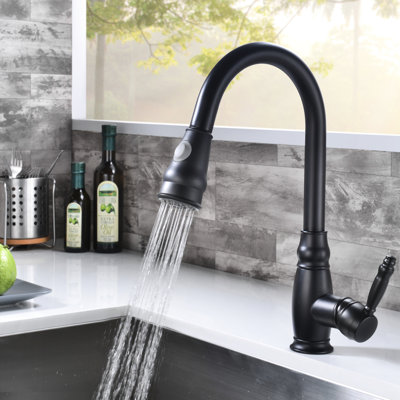 Robinet d'évier de cuisine avec robinet rétractable - Finition noire mate, poignée simple pour un contrôle facile de la température et du débit.