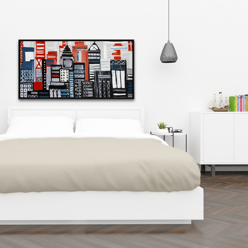 Reproduction de paysage urbain géométrique sur toile