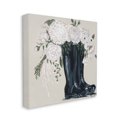 Arrangement de fleurs blanches avec bottes noires