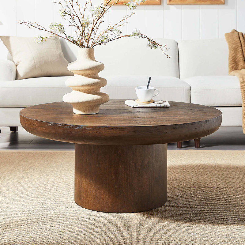 Table basse ronde, plateau en placage de bois et pieds cylindriques