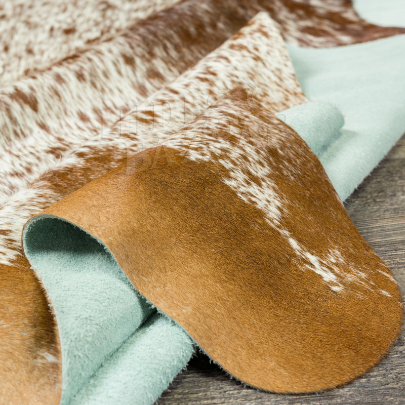 Tapis brun/blanc vache Goetz