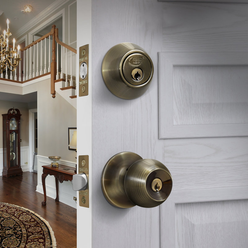 Knobs With Deadbolt Reversible Entry Set, Antique Brass