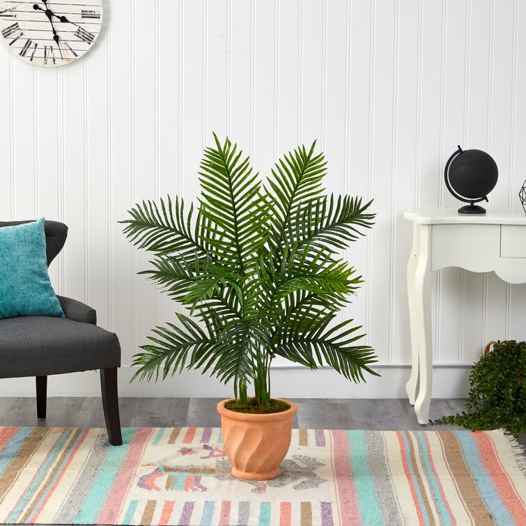 https://assets.wfcdn.com/im/16285353/resize-h755-w755%5Ecompr-r85/1372/137217058/45%27%27+Faux+Palm+Tree+in+Clay+Planter.jpg