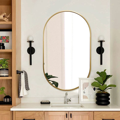 Miroir ovale en métal doré 20 po x 33 po