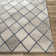 Lynden Geometric Handmade Tufted Beige/Gray Area Rug