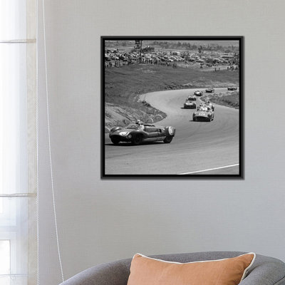 " 1960s Auto Race On Serpentine Section Of Track With Spectators Watching From Small Hill "