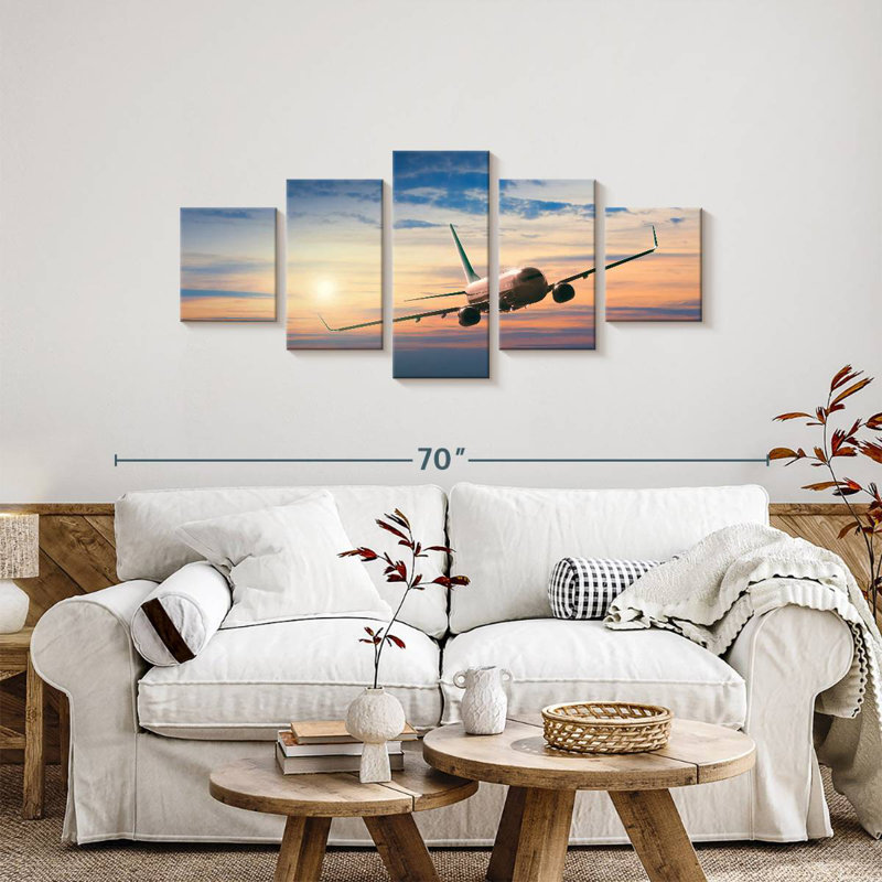 Avion volant au coucher du soleil, H 24 po x l 55 po