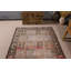 Tapis turc antique parfait pour rehausser l'élégance de votre décor de salon