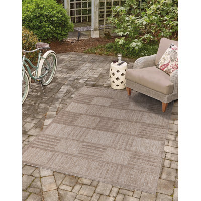 Fazilet Geometric and Striped Indoor / Outdoor Area Rug