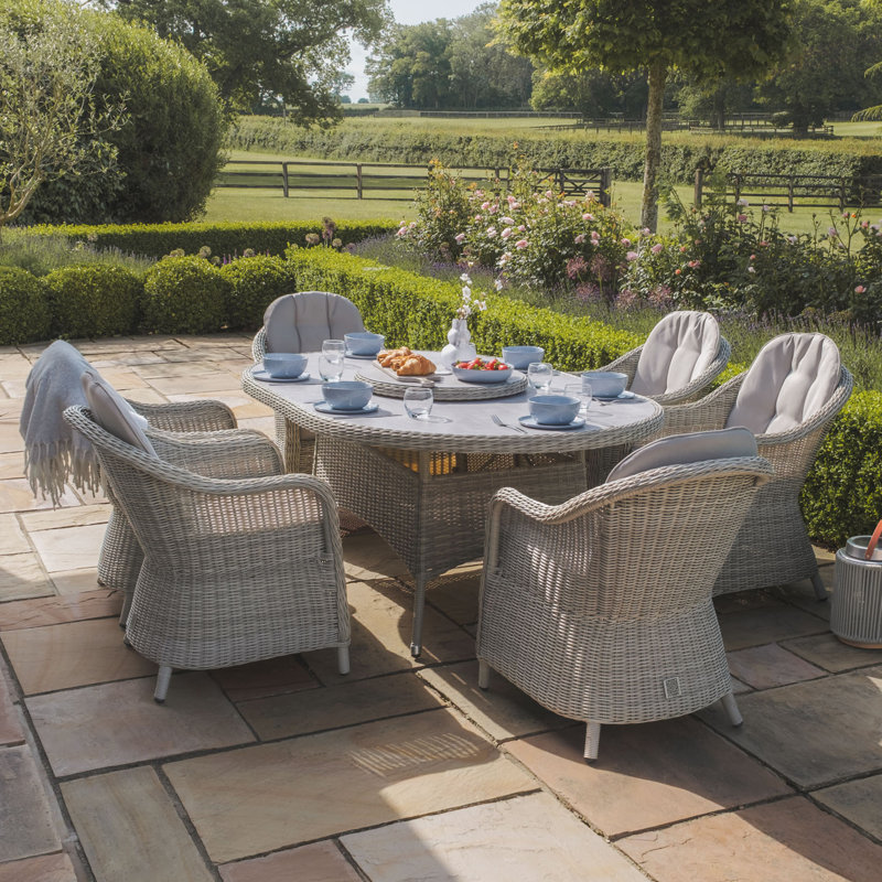 Anissah 6 - Person Patio Dining Set with Oval Table