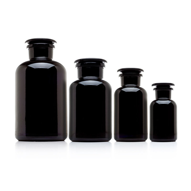 Ensemble de 4 pots d'apothicaire