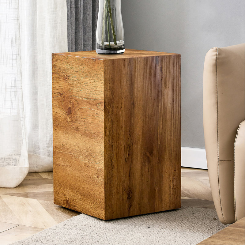 Rehaussez votre espace de vie avec cette table basse moderne en bois aggloméré qui met en valeur des motifs de texture de couleur bois. Il est caractérisé par un design élégant de 11,8 po x 11,8 po x 19,6 po.