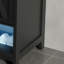 Meuble-lavabo noir, avec lavabo à DEL, portes à fermeture douce et support de rangement.