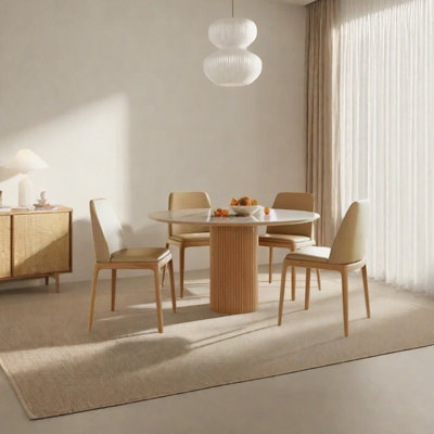 Minimalist round sintered stone dining table set