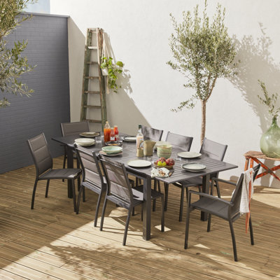 Ansh 8 - Person Patio Dining Set Extendable Rectangular Table