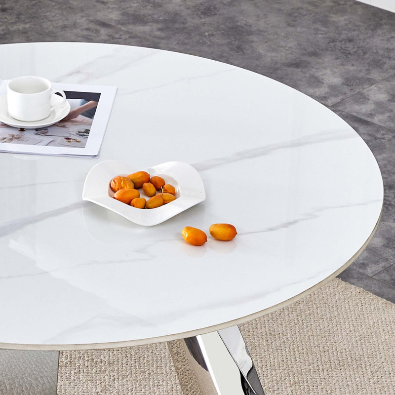 Table en pierre frittée avec pieds en acier