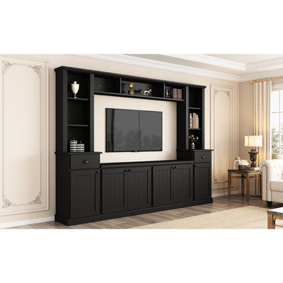 Meuble télé compatible avec téléviseur 75 pouces, noir, avec rangement polyvalent et tablettes réglables en hauteur, finition noire.