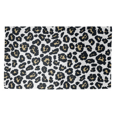 Tapis blanc / noir à imprimé animal