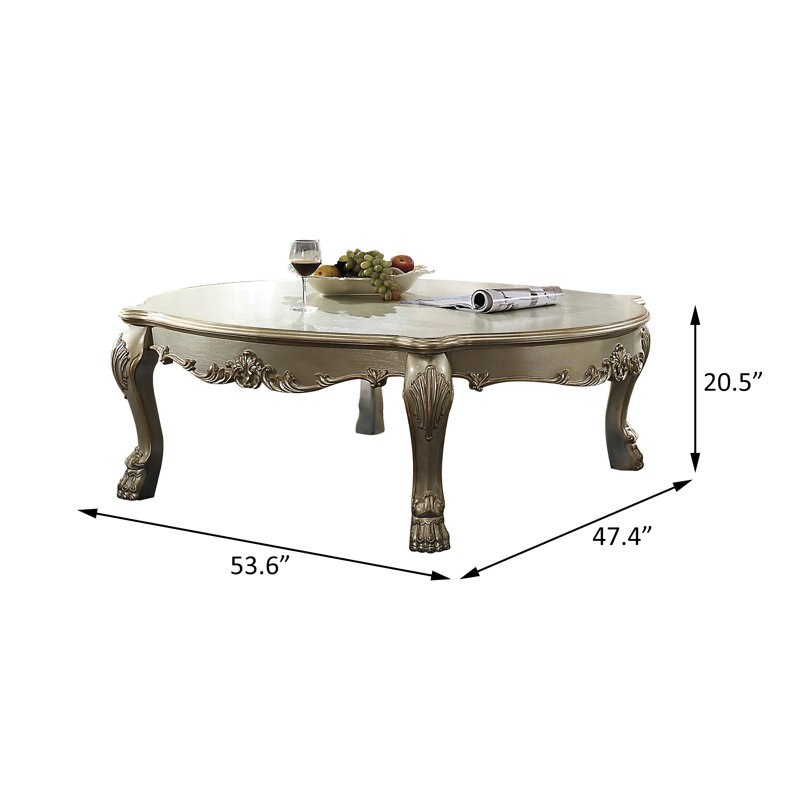 Table basse, patine dorée