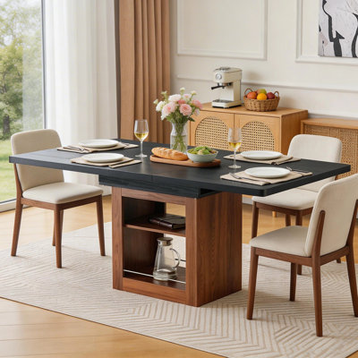 Une table de salle à manger extensible avec espace de rangement et table de salle à manger extensible pour la cuisine. Table rectangulaire noire avec cadre robuste en bois aggloméré pouvant accueillir de 4 à 8 personnes.