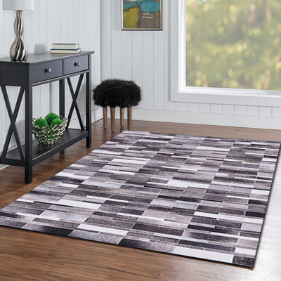 Jameown Patchwork Faux Cowhide Gray/Black Printed Area Rug