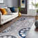 Chartier Machine Woven Floral Area Rug