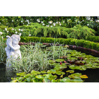 Pond Statue Of Angel by Uliabond - Wrapped Canvas Print
