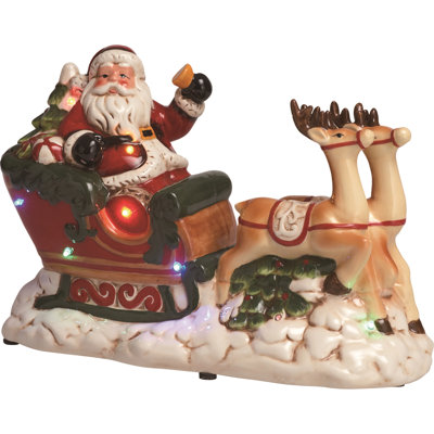 Figurine décorative de Noël en dolomite avec traîneau et lumières DEL multicolores en céramique de table à piles 3 x AAA pré-éclairées pour l'intérieur
