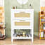 Meuble-lavabo compact élégant avec lavabo en céramique, façade en rotin et rangement ouvert-1896439229